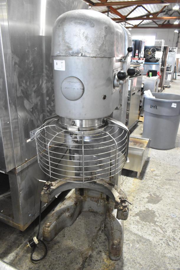 Hobart M 802 commercial 80-quart dough mixer, metal, with bowl guard. Used condition, 230V, 3-phase, visible scuffs and wear.