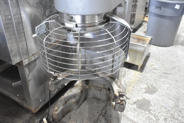 Hobart M 802 commercial 80-quart metal dough mixer with bowl guard, 230V, 3-phase, showing wear, ideal for bakeries.