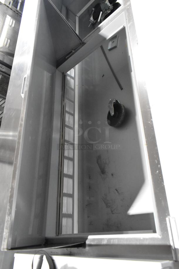 Beverage Air SPE72HC-30M refrigerated sandwich prep table, 72" stainless steel, 3-door, minor scratches, new condition.