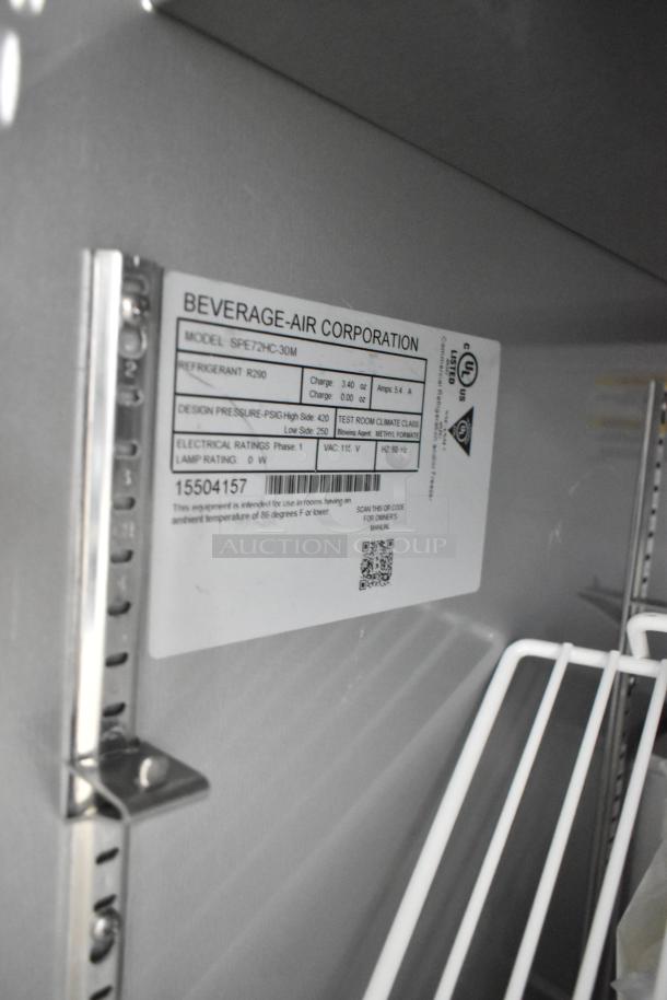 Beverage Air SPE72HC-30M label on stainless steel refrigerated sandwich prep table. Model, electrical details visible.
