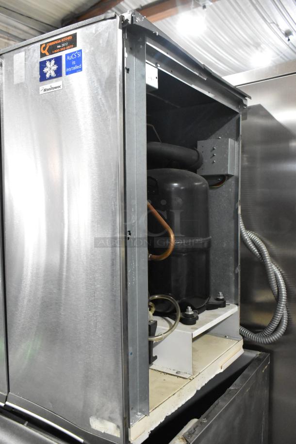 Manitowoc SD1802A stainless steel ice head on bin, commercial use, 208-230V, 1 phase, visible compressor and copper tubing.