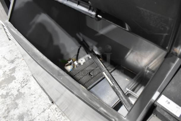 Manitowoc SD1802A commercial ice head and bin in stainless steel. Interior view shows components. 208-230V, 1 Phase.