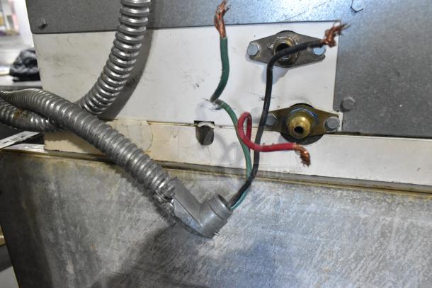 Manitowoc SD1802A stainless steel commercial ice head, visible wiring detail, 208-230V, 1 phase, used condition.