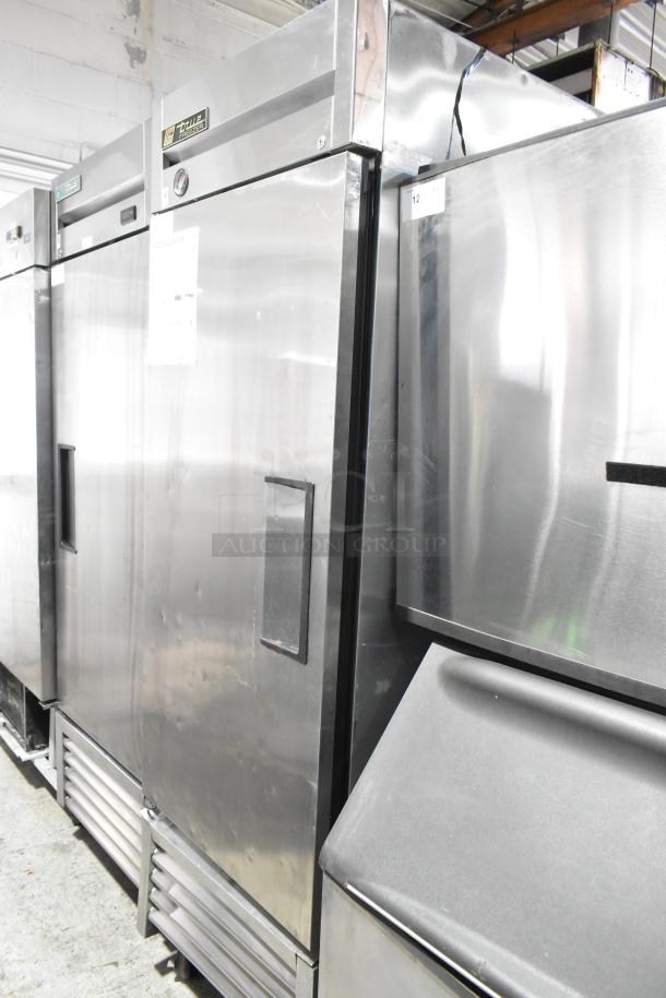 True T-23F stainless steel single-door freezer, commercial use, with poly-coated rack and casters, 115 volts, 1 phase.