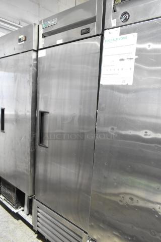 2018 True T-23F-HC stainless steel single door reach-in freezer, commercial casters, poly-coated rack, 115V, 1 phase.