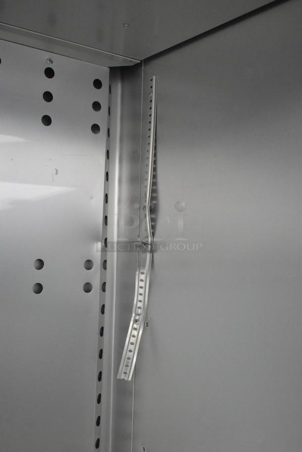 2018 True T-23F-HC stainless steel commercial freezer interior, poly coated rack, commercial casters, vented design.