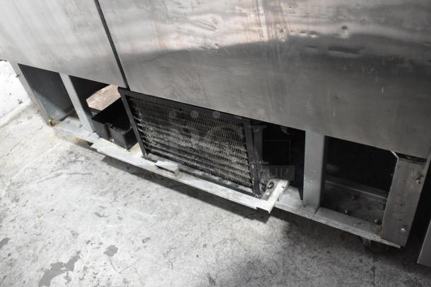 Avantco 178A49FHC stainless steel commercial 2-door reach-in freezer, poly-coated rack, commercial casters, 115V, 1 phase.