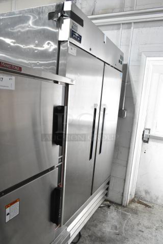 Arctic Air AR49E stainless steel 2-door commercial cooler with poly-coated rack and casters. Model AR49E, 115V, 1 phase.