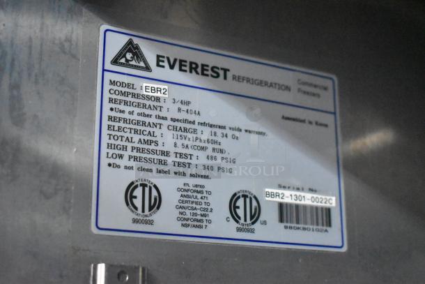Everest EBR2 Stainless Steel 2 Door Reach In Cooler label, showing model details, electrical specs, and certifications.