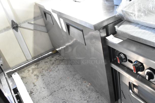 True TUC-60 stainless steel 2-door undercounter cooler on casters, 115V, 1 Phase, good condition, commercial use.