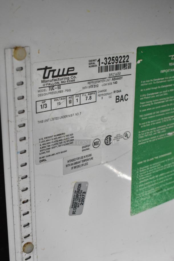 True TUC-60 stainless steel commercial cooler, 2 doors, on commercial casters. 115V, 1 Phase. NSF certified; model label shown.