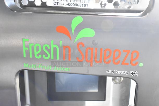 JBT 2 GEN MFJ Fresh N Squeeze citrus juicer, stainless steel, commercial casters, 120V, 1 phase, multi-fruit juicer label visible.