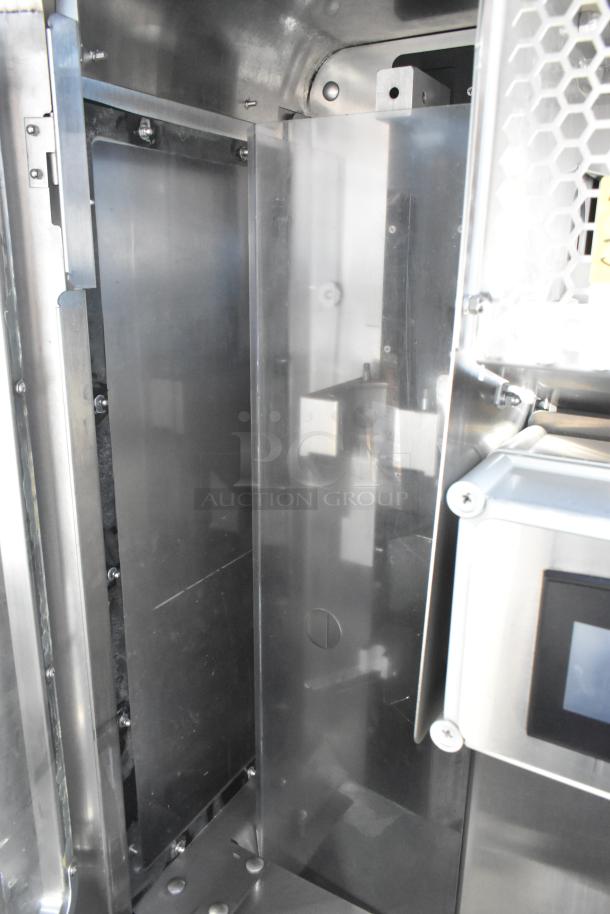 JBT 2 GEN MFJ Fresh N Squeeze commercial citrus juicer, stainless steel, 120V, 1 phase, on casters, floor style, mint condition.