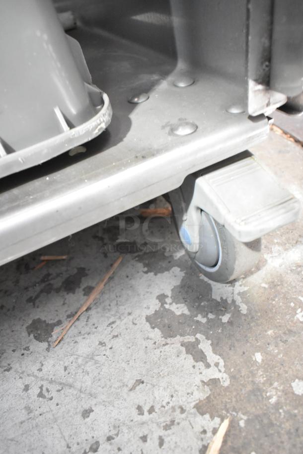 JBT 2 GEN MFJ Fresh N Squeeze citrus juicer on commercial casters, stainless steel, 120V, 1 phase, floor style.