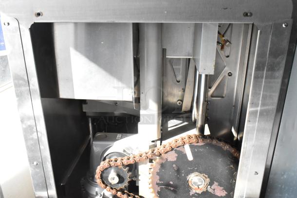 LATE MODEL JBT 2 GEN MFJ Fresh N Squeeze stainless steel commercial citrus juicer, visible mechanics, on casters, 120V, 1 phase.