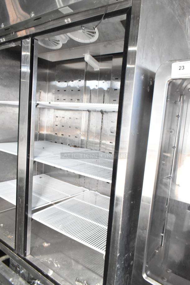 2021 Padela PDB-2F-HC stainless steel commercial 2-door reach-in freezer, missing doors, with poly-coated racks, 115V, 1 phase.