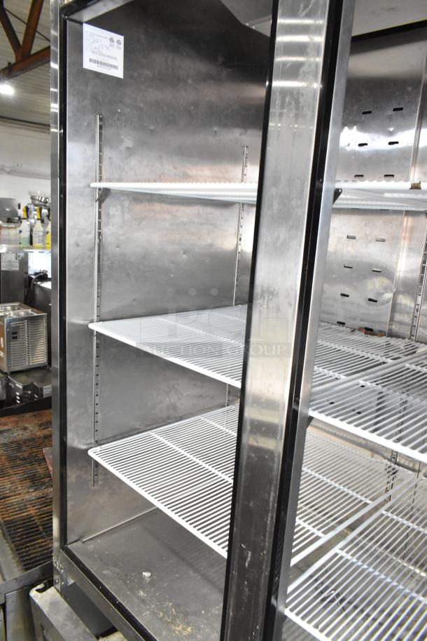 2021 Padela PDB-2F-HC stainless steel commercial freezer, 2-door, missing doors, poly coated racks, 115V, 1 phase.