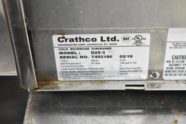 Crathco D25-3 stainless steel beverage machine label, showing model, serial number, and specs: 115V, 1 phase, R134a refrigerant.