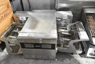 Ovention stainless steel commercial countertop electric conveyor pizza oven, 208/240 volts, 3 phase, used condition.