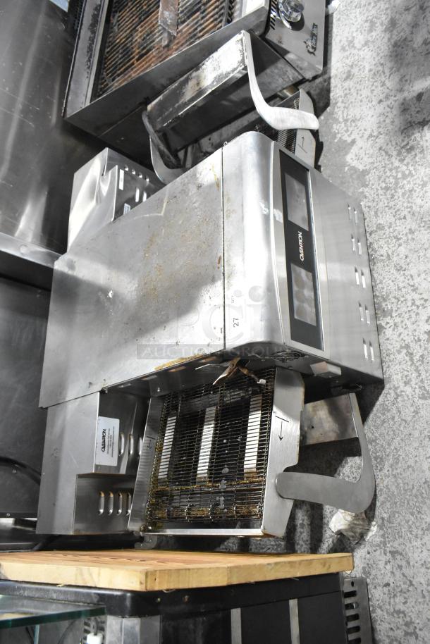 Ovention stainless steel commercial countertop conveyor pizza oven, electric, 208/240V, 3 phase, used condition.