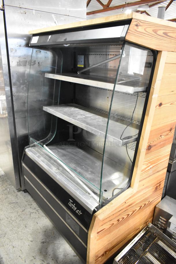 Turbo Air TOM-40MB commercial merchandiser, metal shelves, glass front, 120V, 1 Phase. Good condition, ideal for retail use.