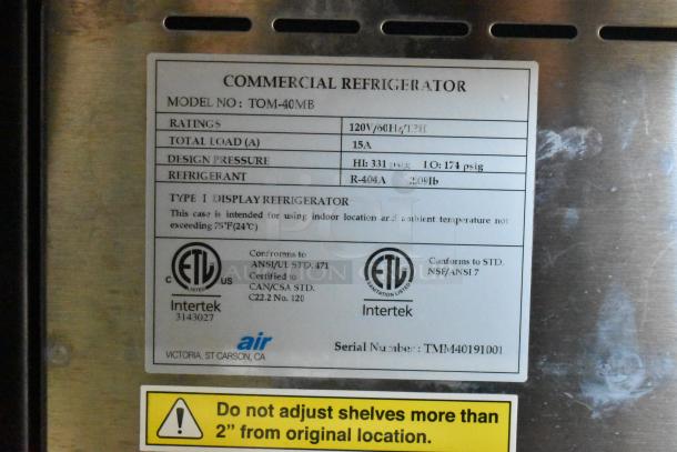 Turbo Air TOM-40MB commercial merchandiser label showing model and specs; 120V, 1 phase, ETL listed, R-404A refrigerant.