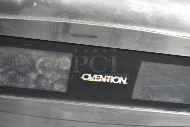 Ovention S1200 stainless steel commercial electric conveyor pizza oven, 208/240V, 3 phase, visible logo, used condition.