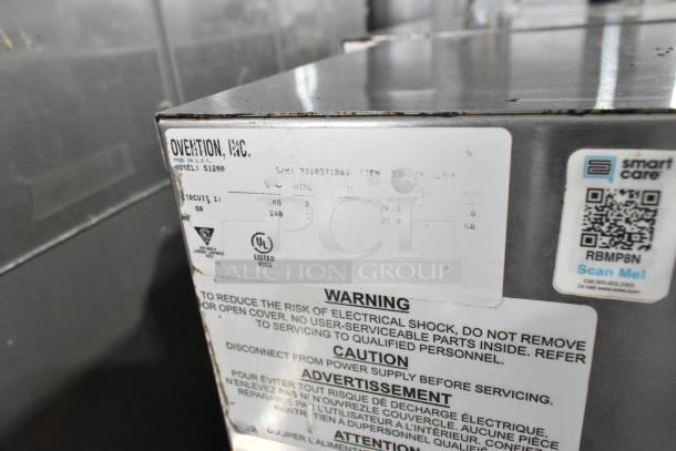 Ovention S1200 stainless steel commercial conveyor pizza oven, electric-powered, 208/240 volts, 3 phase. Model info on label.