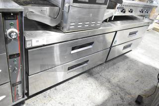 Hoshizaki stainless steel 4-drawer chef base on commercial casters, 115 volts, 1 phase, excellent condition, visible item tag.