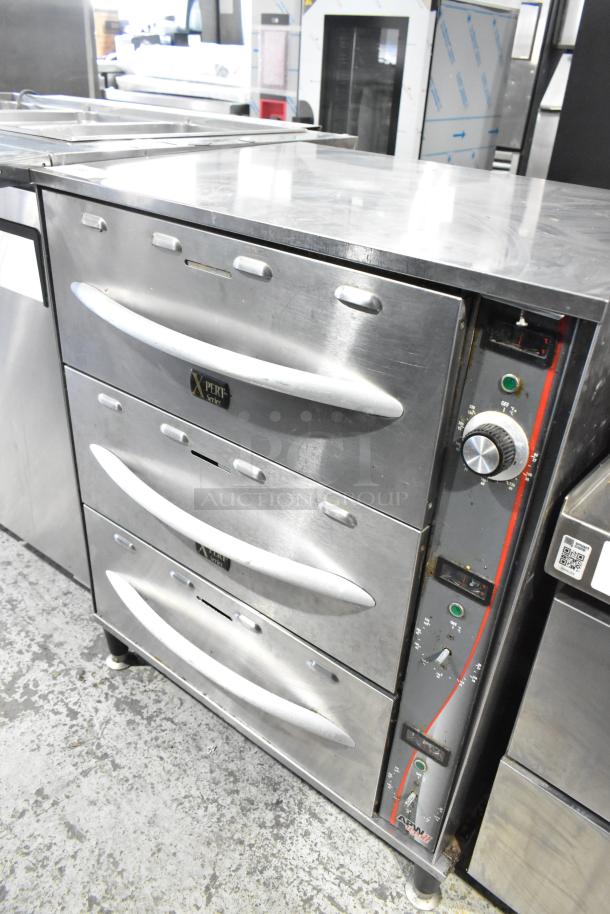 APW Wyott HDDi-3-120-4L-S stainless steel 3-drawer warming drawer, commercial grade, 120V, 1 phase, with control panel.