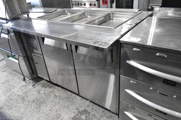 Turbo Air JBT-48-N stainless steel refrigerated buffet table, 115V, with commercial casters, good condition.