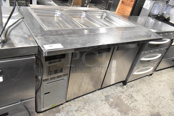 Turbo Air JBT-48-N stainless steel refrigerated buffet table, on commercial casters, with 115V, 1 phase power.