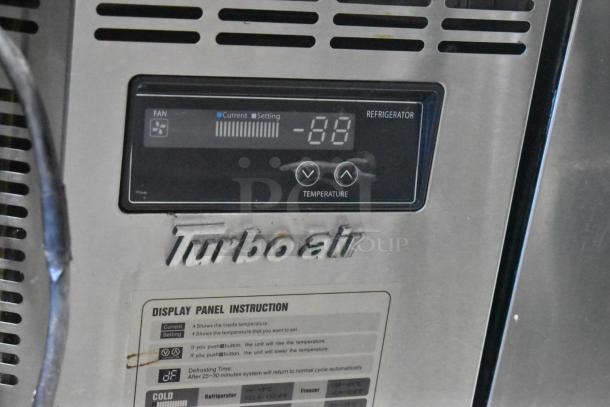 Turbo Air JBT-48-N refrigerated buffet table, stainless steel, features temperature display, model label visible, on casters.