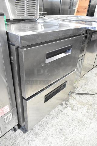 Stainless steel commercial 2-drawer undercounter cooler, 115 volts, 1 phase. Features durable finish and efficient refrigeration.