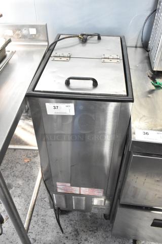 Silver King stainless steel commercial chest cooler or freezer on casters, 115V, 1 phase, with a top handle and visible label.