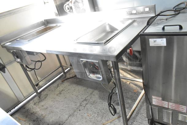 APW Wyott stainless steel commercial 2 well steam table, 115 volts, 1 phase, in good condition, with visible control panel and wiring.