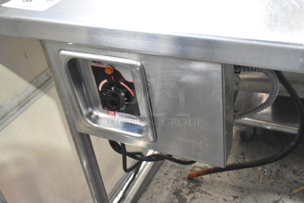 APW Wyott stainless steel 2 well steam table, 115 volts, 1 phase, with control dial and service label.