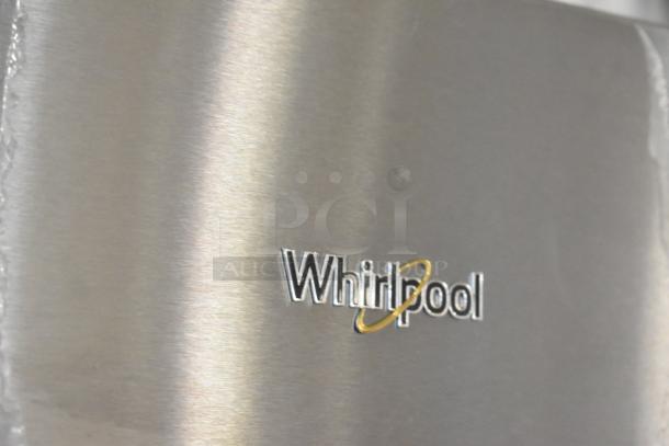 Whirlpool 21MSTFATR6 stainless steel reach-in cooler with freezer. Brand new, scratch and dent. Model logo visible.