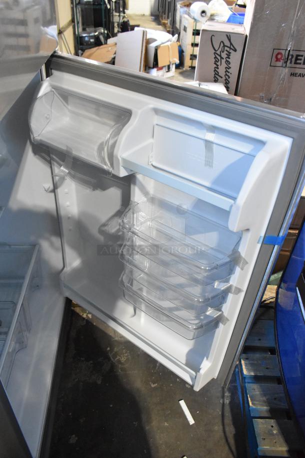 BRAND NEW Whirlpool 21MSTFATR6 stainless cooler/freezer with dents. Interior view, shelving shown. 115V, 1 Phase.
