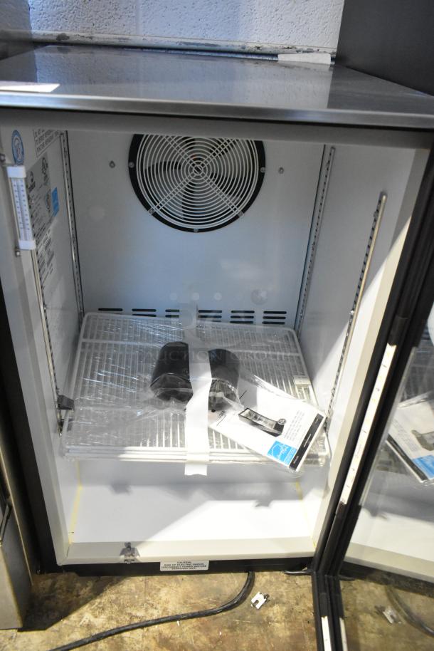 Imbera EVC04 Metal Mini Cooler Merchandiser, 115V, 1 Phase. Features shelving, interior fan, and product label.