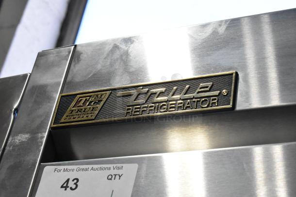 2016 True T-35 stainless steel commercial cooler, 2 doors, poly-coated racks, commercial casters, 115V, excellent condition.