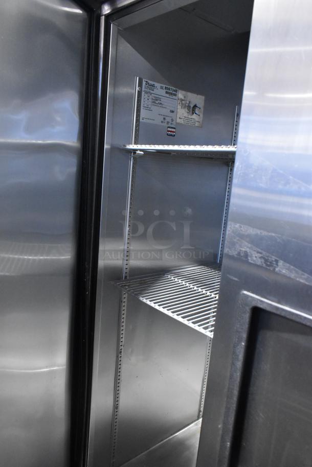 True T-35 stainless steel commercial cooler, 2-door, with poly coated racks, on commercial casters, excellent condition.