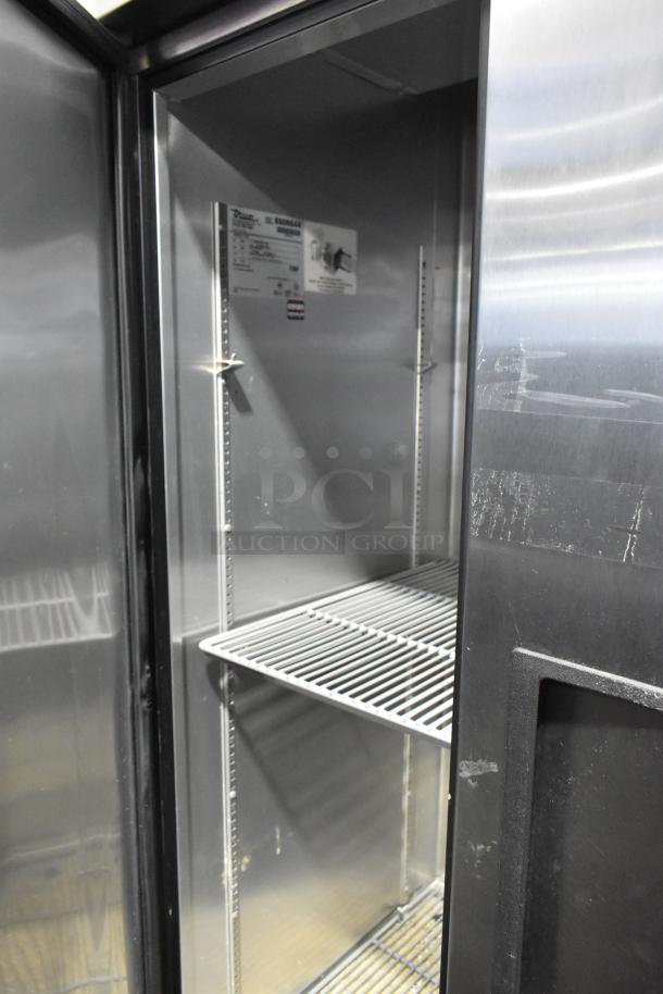 True T-35 stainless steel commercial 2-door cooler with poly-coated racks, on commercial casters, 115V, 1 phase.