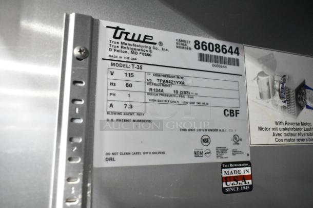 True T-35 commercial cooler label, 115V, 1 phase, features model info, serial number 8608644, and NSF certification.