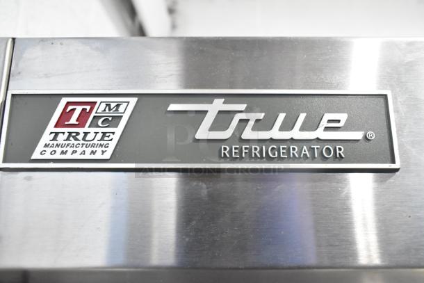 2017 True T-35 stainless steel commercial cooler, 2 doors, poly coated racks, 115V, 1 phase, True brand logo visible.