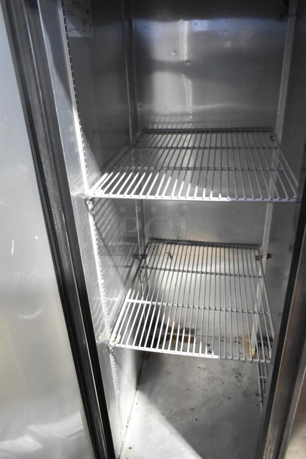 2017 True T-35 reach-in cooler, stainless steel, 2-door, poly coated racks, 115V, 1 phase, interior view, good condition.