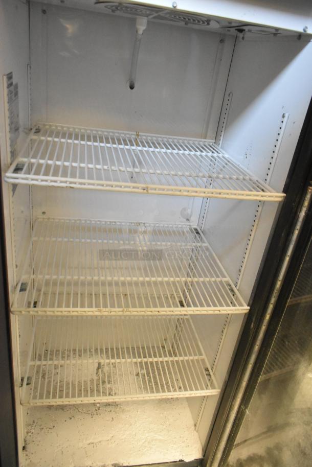 True GDM-12-HC commercial cooler, single door, metal frame, with three poly-coated racks. Suitable for merchandising, 115V.