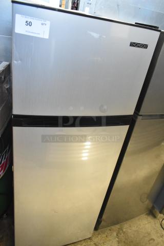 2021 Thomson TFR725-C stainless steel reach-in cooler with freezer, 115V, 1 phase. Features minor wear, label indicating lot #50.