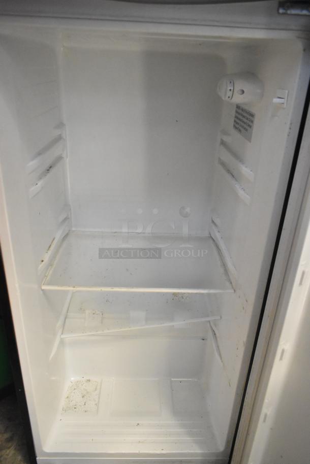 2021 Thomson TFR725-C Reach In Cooler and Freezer interior, showing shelves and slight wear. 115V, 1 Phase.