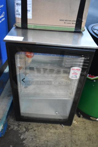 Imbera EVC04 metal commercial mini cooler merchandiser, 115 volts, 1 phase, glass front, in used condition with visible markings.